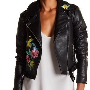 Black leather jacket with embroidered flow…